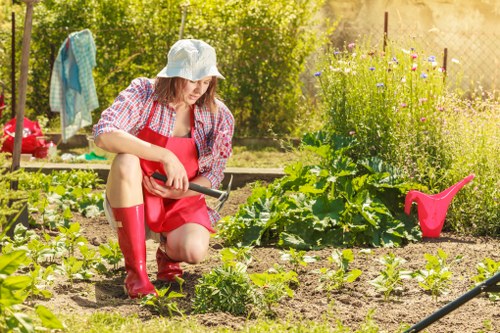 Landscaping team preparing a garden booking and service agreement