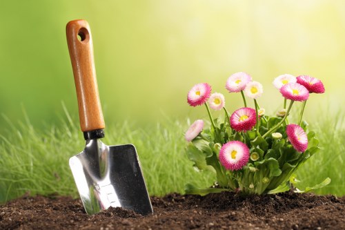 Professional groundwork and paving preparation for a patio in Poplar