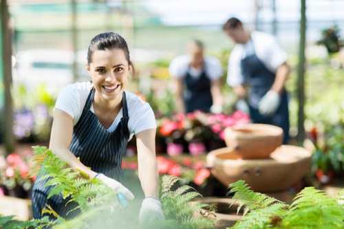 Commercial soft landscaping with shrubs and tidy planting in Poplar